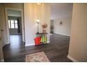 Inviting home entryway featuring sleek hardwood floors and neutral paint at 1121 Canterbury Ct, Indianapolis, IN 46260