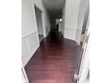 Welcoming entryway boasting beautiful hardwood floors and elegant trim at 1272 Southlake E Ave, Greenwood, IN 46143