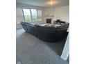 Bright living room features a fireplace and ample natural light at 1272 Southlake E Ave, Greenwood, IN 46143