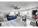 Bright and airy living room featuring large windows, comfortable seating, and stylish decor for a relaxing ambiance at 1527 N Washington St, Danville, IN 46122