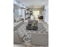 Open-concept design with a living room that flows seamlessly into the kitchen and dining area at 3811 N Lawndale Ave, Indianapolis, IN 46254