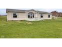 Charming single-story home featuring a tidy front yard with simple landscaping at 1528 E 300 N, Lebanon, IN 46052