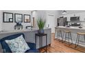 Inviting living room boasts an open layout flowing into a kitchen with modern finishes at 2118 Lexington Ave, Indianapolis, IN 46203