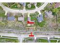 Overhead view showing a well-located home near the Monon Trail, surrounded by lush greenery and neighborhood streets at 334 Stonehedge Dr, Carmel, IN 46032