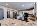 Spacious kitchen with stainless steel appliances, granite countertops, and an open layout at 416 Concord Way, Greenwood, IN 46142