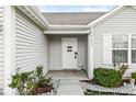 Close-up of the charming front door and entry of the home at 9157 Tansel Crk Dr, Indianapolis, IN 46234