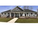 Beautiful new construction home with stylish trim and a sidewalk at 19113 River Jordan Pass, Westfield, IN 46074