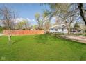 Expansive backyard with lush green grass, perfect for outdoor activities at 3414 Arbor Ave, Indianapolis, IN 46217