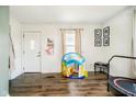 Bright living room with hardwood floors and a welcoming atmosphere at 3414 Arbor Ave, Indianapolis, IN 46217