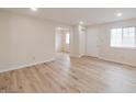 Spacious living room featuring hardwood floors, neutral paint, and an adjacent doorway at 3648 Valley Lake Dr, Indianapolis, IN 46227
