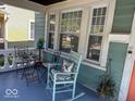 Relaxing front porch with seating area, perfect for enjoying the outdoors at 37 N Arlington Ave, Indianapolis, IN 46219