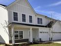 Charming two-story home featuring a one-car garage, white siding, and inviting front porch at 3767 Thomas Jefferson Ct, Westfield, IN 46074