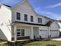Charming two-story home featuring a one-car garage, white siding, and inviting front porch at 3767 Thomas Jefferson Ct, Westfield, IN 46074