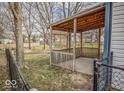 Back yard wooden patio with a fence to a large private yard, great for entertaining and relaxing at 5752 Echo Way, Indianapolis, IN 46278