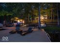 Inviting outdoor lounge area with comfortable seating, ideal for relaxing and entertaining by the water at 7014 Eagle Dr, Nineveh, IN 46164