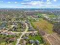 Aerial view of the residential neighborhood, revealing a vast network of homes and community at 84 Beech Ct, Whiteland, IN 46184