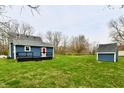 Large backyard with new deck and shed offers room to roam and add value at 10880 N 23Rd St, Elwood, IN 46036