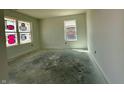 Bright bedroom with white walls and large windows letting in natural light at 1268 Fleming Dr, Greenfield, IN 46140
