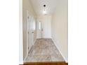 Welcoming entryway with neutral walls and tile flooring leading to the rest of the home at 2623 Kirk Ct, Lebanon, IN 46052