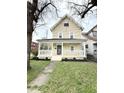 Charming two-story home with a covered front porch and well-maintained landscaping at 3502 N Illinois St, Indianapolis, IN 46208