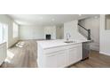 Spacious kitchen featuring a central island and hardwood floors at 827 Allandale Ave, Westfield, IN 46074