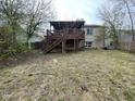 Spacious backyard featuring a large wooden deck, offering ample space for outdoor activities at 11106 Wismar Dr, Indianapolis, IN 46235