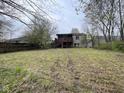 Spacious backyard featuring a large wooden deck, perfect for outdoor entertaining and relaxation at 11106 Wismar Dr, Indianapolis, IN 46235