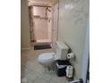 Bathroom featuring a walk-in shower, tile flooring and a decorative wall at 13346 N Miller Dr, Camby, IN 46113