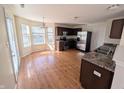 Bright kitchen featuring stainless steel appliances, wood cabinets, granite countertops, and ample natural light at 18904 Planer Dr, Noblesville, IN 46062