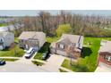 Aerial view of the property showcasing its location near green spaces and neighborhood layout at 3038 Arrowroot Ln, Indianapolis, IN 46239