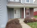 View of home's brick front entrance showing door and exterior at 3097 Limber Pine Dr, Whiteland, IN 46184