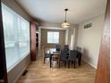 Bright dining room with large windows and ample seating for Gathering and guests at 8859 Delaney Dr, Fishers, IN 46038