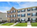 Attractive townhouse exteriors feature a combination of brick and siding, enhancing curb appeal at 17269 Dallington St, Westfield, IN 46074