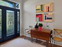 Welcoming foyer featuring stylish decor and a beautiful front door with decorative glass at 1995 Brookfield Ct, Columbus, IN 47201