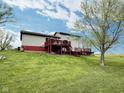 Expansive backyard featuring multi-level deck, perfect for outdoor living and enjoying the serene surroundings at 3703 E Gore St, Columbus, IN 47201