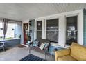 Inviting covered porch with comfortable seating and stylish decor at 433 Eastern Ave, Indianapolis, IN 46201