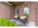 Cozy porch area with comfortable seating, perfect for relaxing and enjoying the outdoors at 6081 Boulder Ct, Columbus, IN 47201