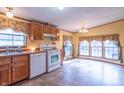 Sunny dining area features multiple windows with views of the outdoors at 2088 Brandywine Ln, Martinsville, IN 46151