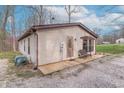 Charming single-story home with wood deck and gravel driveway at 2088 Brandywine Ln, Martinsville, IN 46151