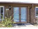 Inviting front entrance with elegant double doors and brick facade at 506 N County Road 900 E, Avon, IN 46123