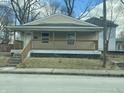 Inviting home featuring a spacious front porch perfect for relaxing, showcasing curb appeal and classic architecture at 507 W 29Th St, Indianapolis, IN 46208