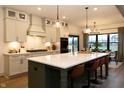 Beautiful kitchen with an oversized kitchen island, modern appliances, and stylish pendant lighting at 5086 Oak Ridge Trl, Columbus, IN 47201