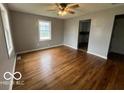 Sunlit living room featuring hardwood floors and fresh paint, ready for your personal touch at 517 Dicks St, Lebanon, IN 46052