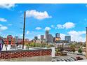 Stunning city skyline view from rooftop deck, featuring modern buildings at 741 Bates St, Indianapolis, IN 46202