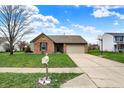 A single-story home with a well-maintained lawn and a mailbox at the front of the property at 8312 Eagles Nest Dr, Avon, IN 46123