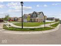 Corner lot home with a well-maintained lawn and traditional architecture at 1305 Bontrager Ln, Shelbyville, IN 46176