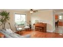 Inviting living room featuring hardwood floors and elegant furniture at 1401 Runningbrook Ln, Avon, IN 46123