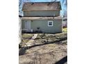 A spacious backyard, great for outdoor activities, with a grill and a shed at 1708 W 7Th St, Muncie, IN 47302
