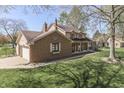 Beautiful home featuring a spacious garage and well-maintained landscaping at 1772 Woodridge Pl, Greenwood, IN 46143