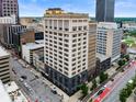 Aerial view of a brick commercial building in the city at 110 Washington St # 301, Indianapolis, IN 46204